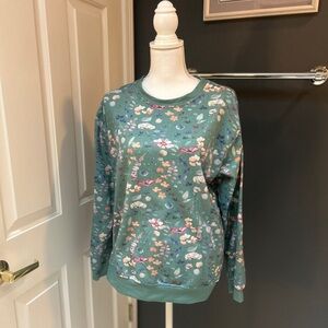 Green floral long sleeve. Thin sweatshirt material. Gently used.
